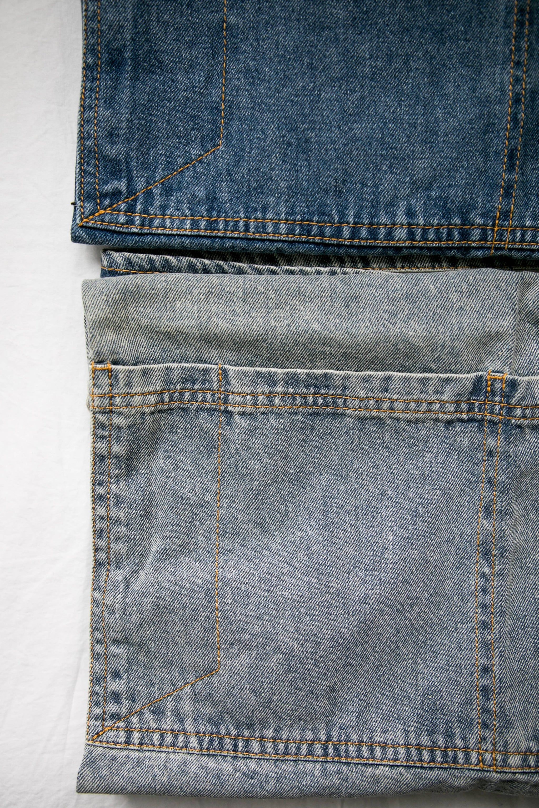 dark blue denim on top, light denim on bottom