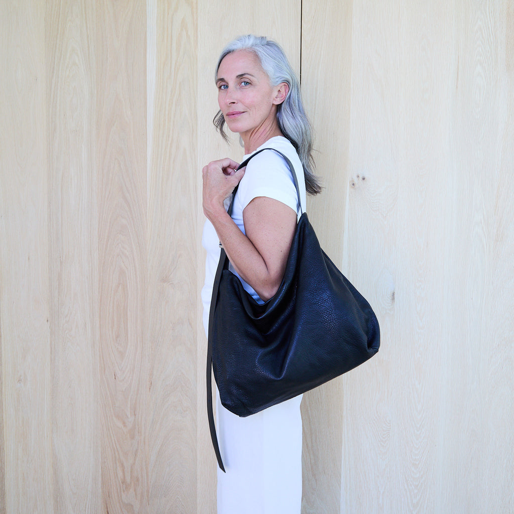 model wearing a large central boho in shoulder setting 