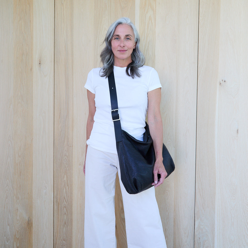 model wearing large central boho as crossbody 