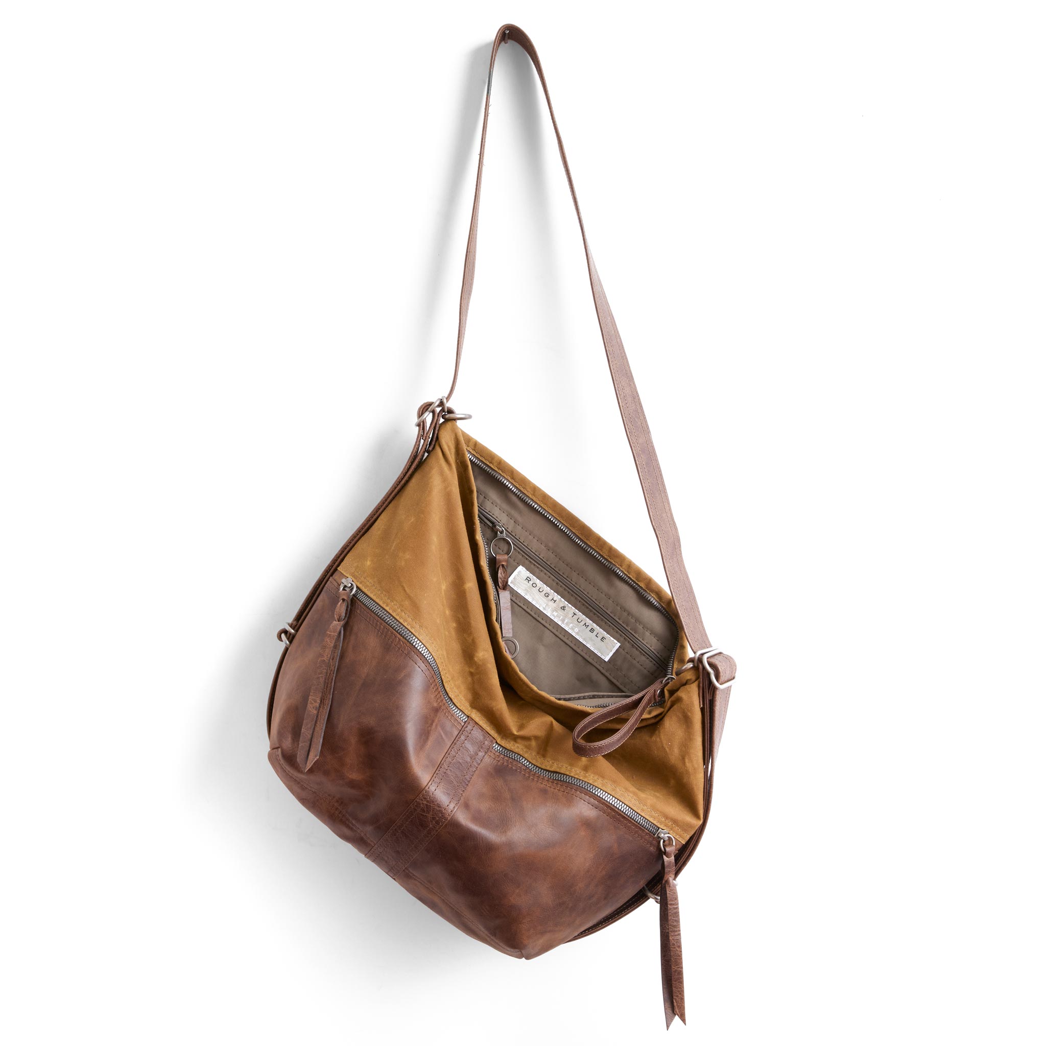 city safari double zip medium in whiskey waxed canvas and rustic pecan, showcasing interior essex lining