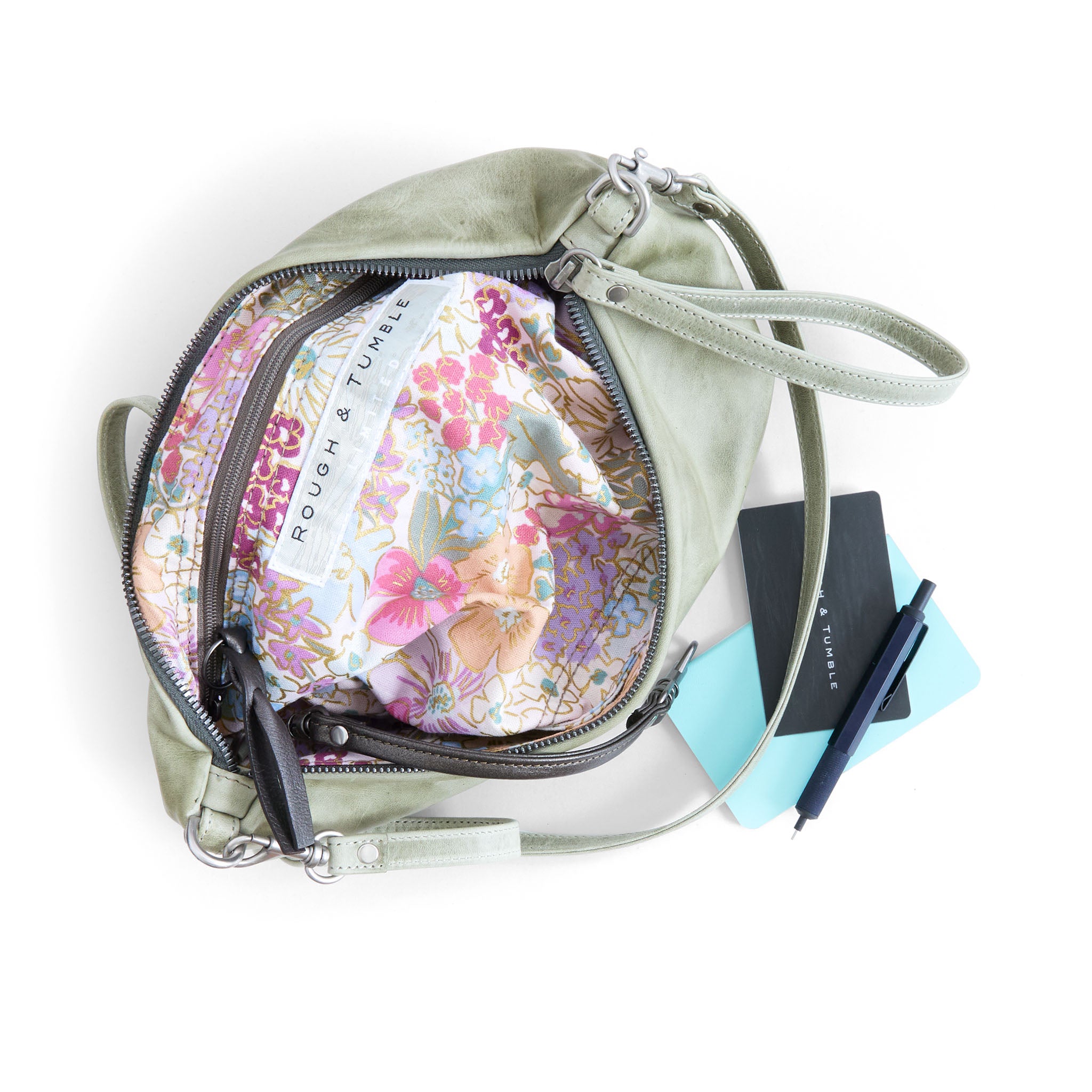 covet in sea foam, showcasing interior rifle paper co. mimi plum lining