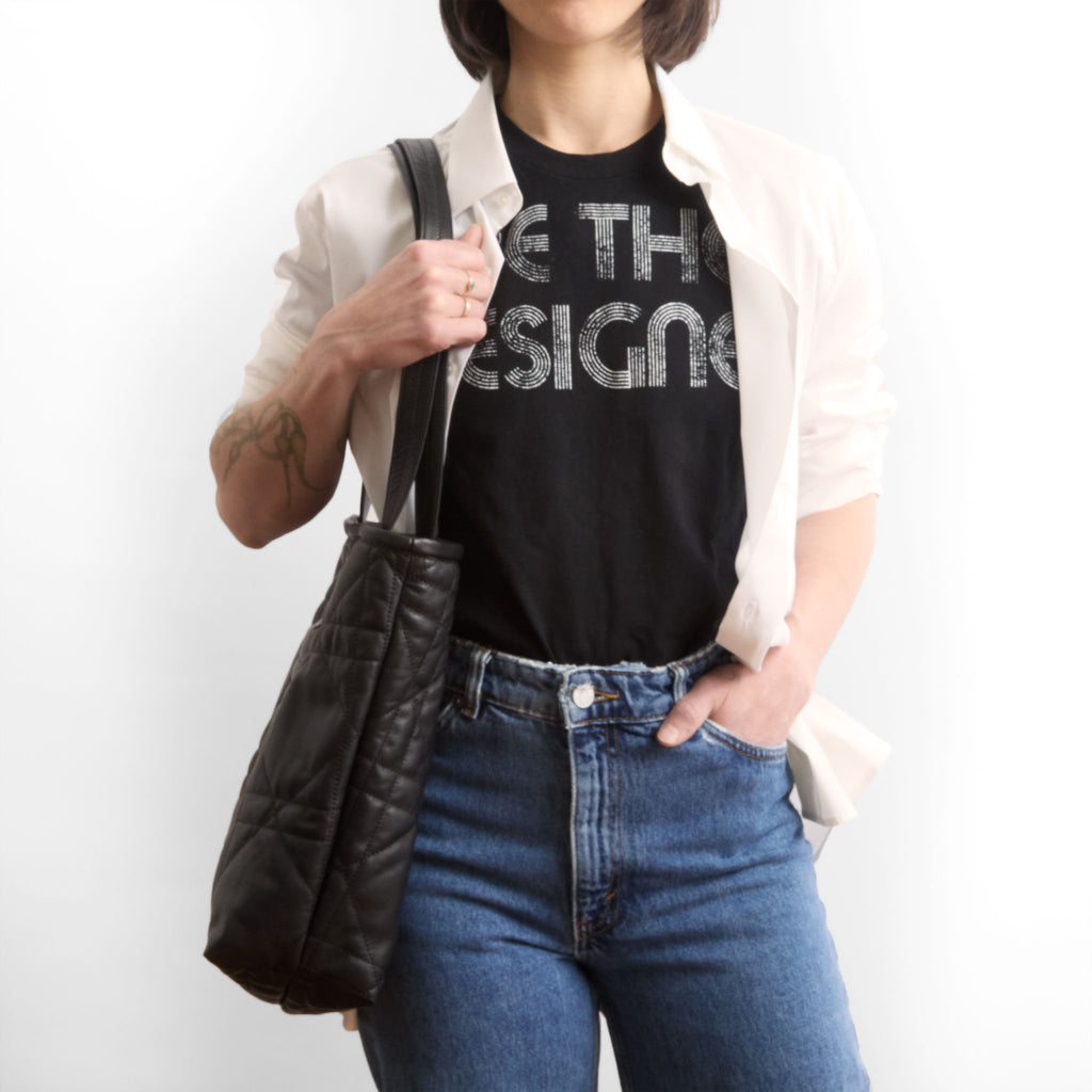 model wearing the asher, size large, in quilted pashi black 