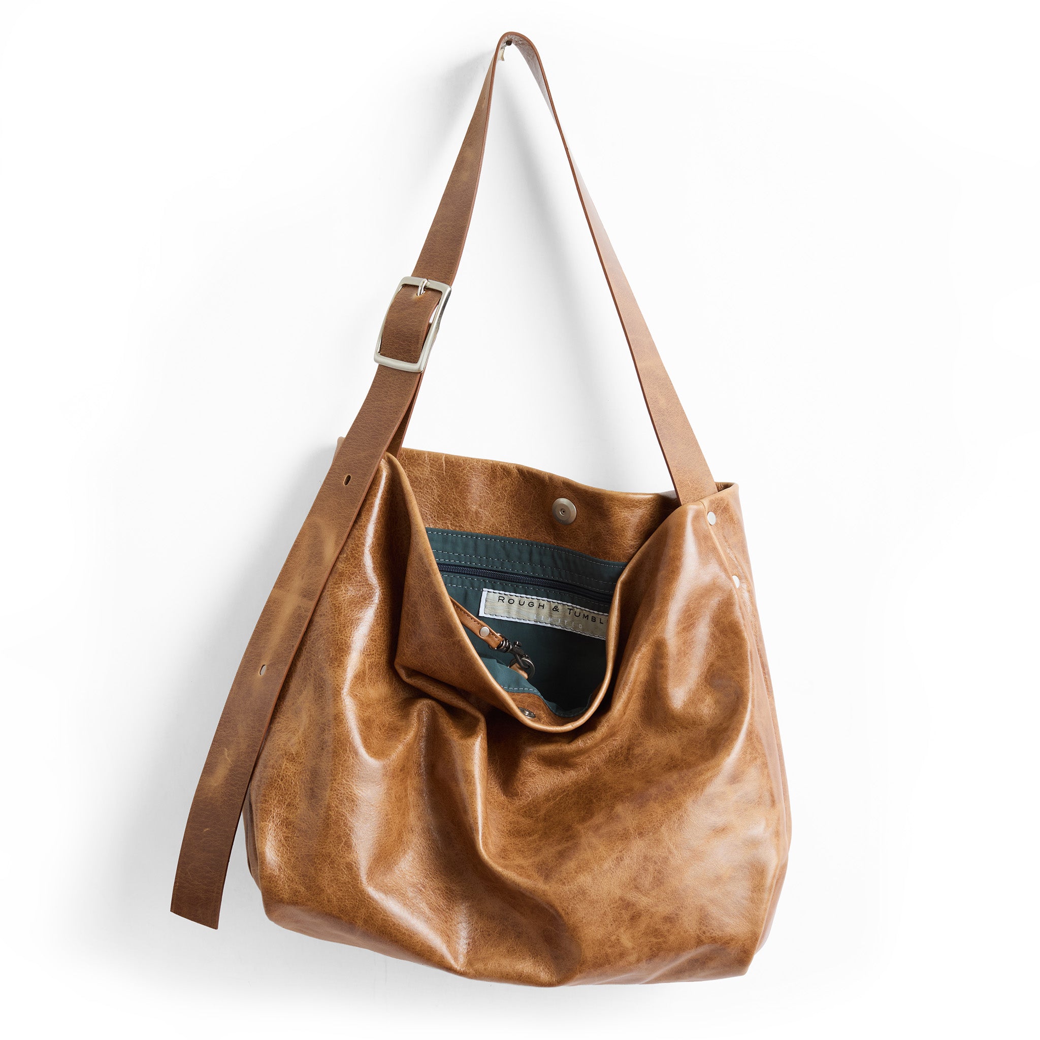 large central boho in light saddle, showcasing interior canada blue lining