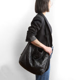 quilted pashi black | boho e+w size large in quilted pashi black being modeled in shoulder setting