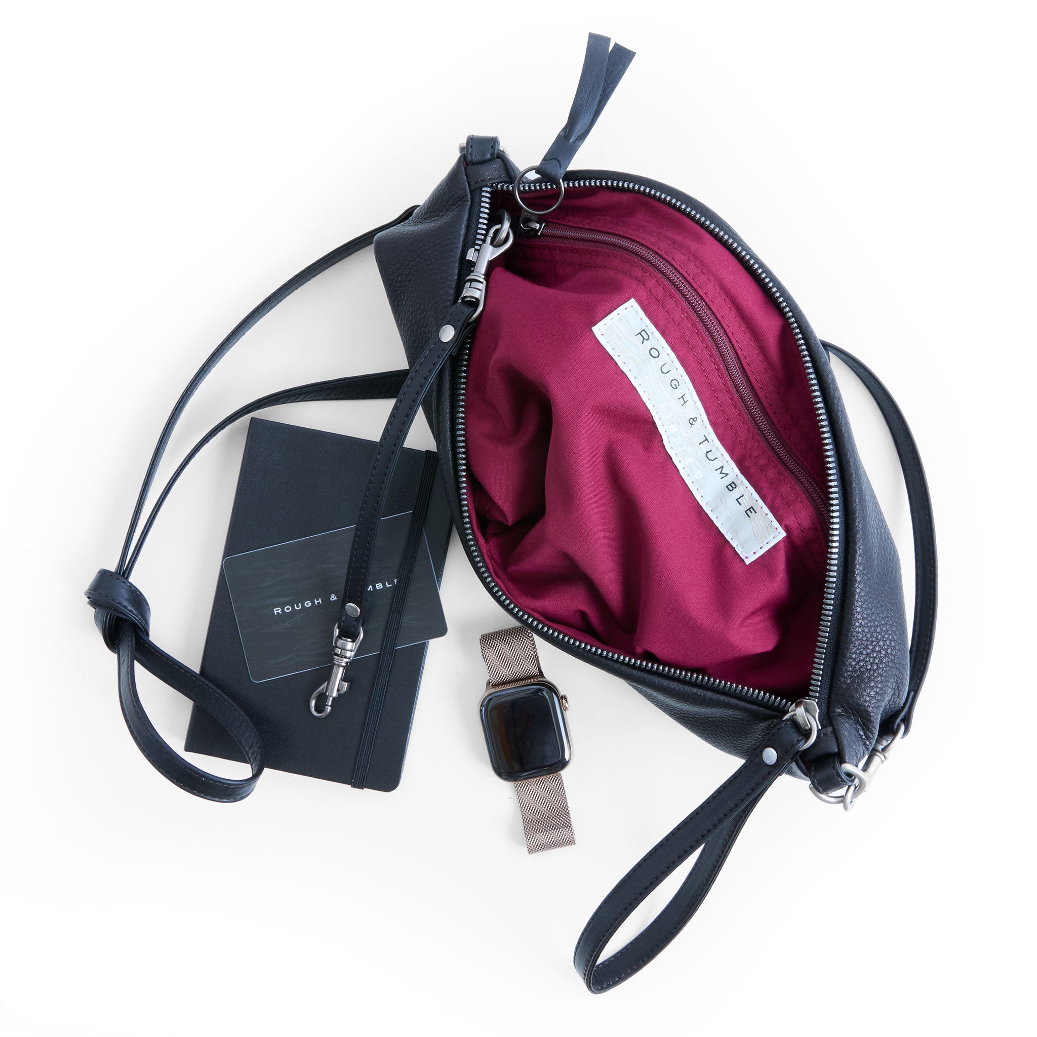 the covet in nero, showcasing interior jam lining and zippered pocket