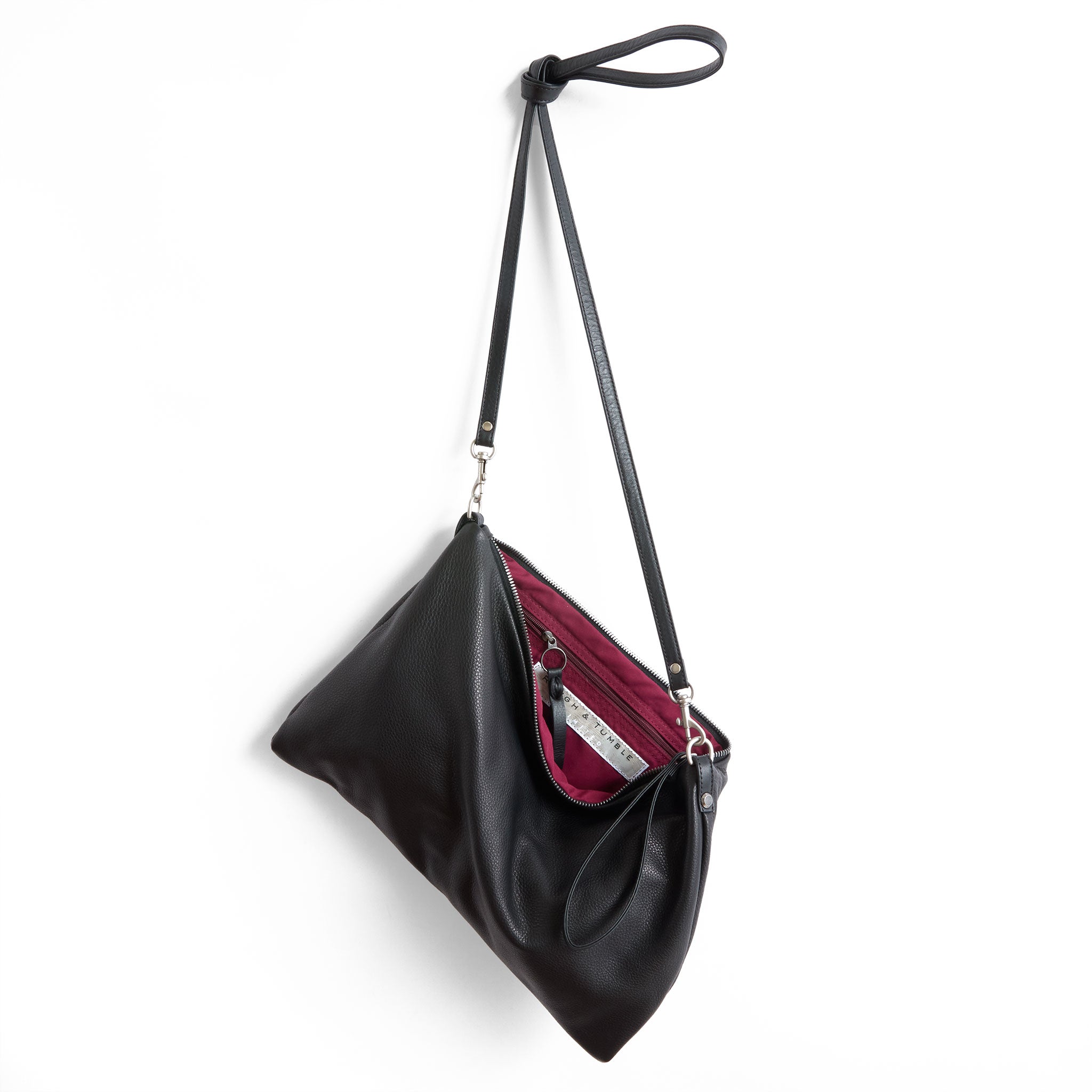 the covet in nero, showcasing interior jam lining and zippered pocket