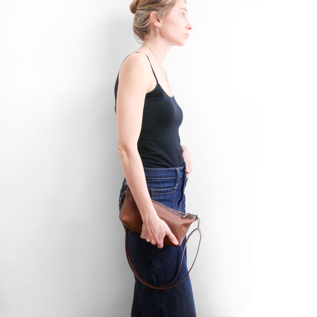 side view of model holding the wren 