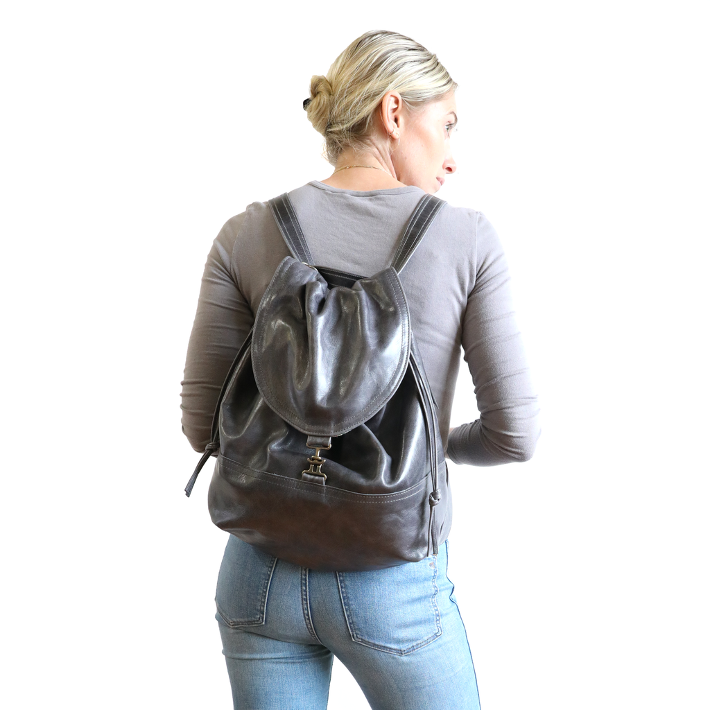 Back view of model weating 1904 large as a backpack. 