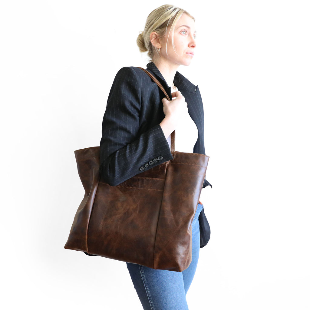 model holding scarborough in rustic pecan 